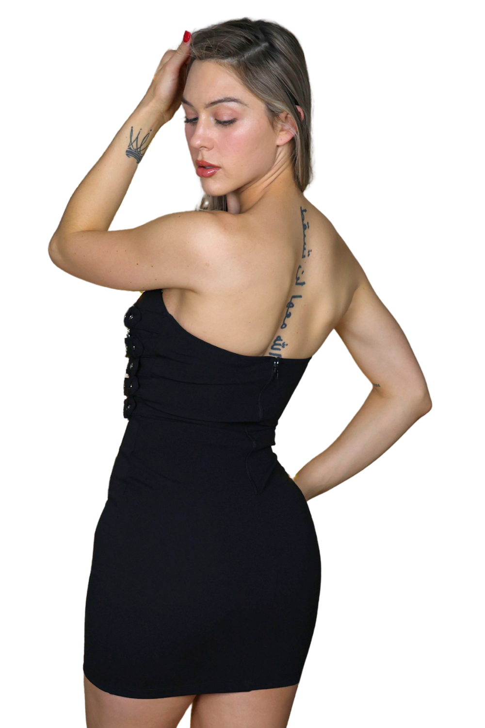 Woman wearing a black dress with a white background