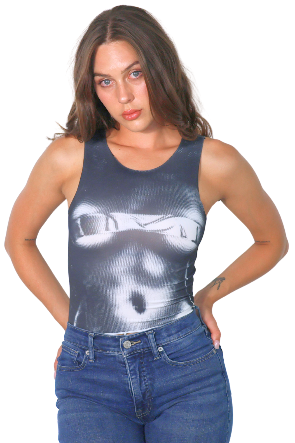 Woman wearing a tank top with a graphic design on a white background
